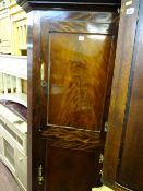 Early Victorian mahogany standing corner cupboard with panelled doors