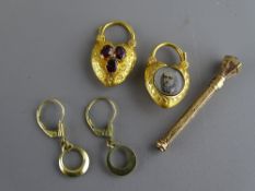 Pair of amethyst set Victorian pinchbeck lockets, small gilt decorated propelling pencil with