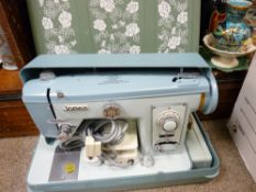 Cased Jones sewing machine with pedal E/T