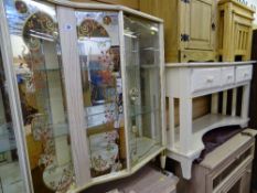 Ornate two door china display cabinet and a white hall table with three central drawers