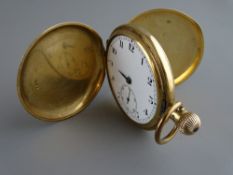 Nine carat gold cased full hunter gent's pocket watch (dial hand and glass missing), 90 grms gross