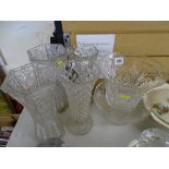 Good pedestal cut glass vase, four other vases and a bowl