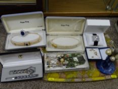 Collection of costume jewellery, boxed lady's watch and a pottery hat pin holder with pins