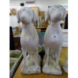 Pair of reconstituted stone seated dog garden ornaments