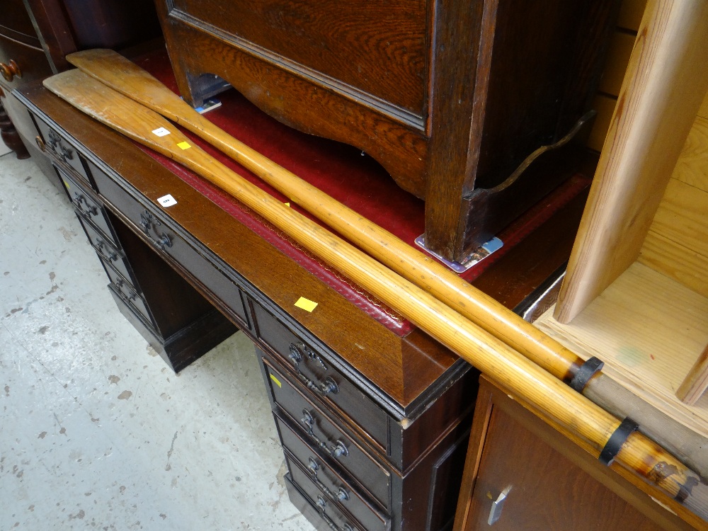 A pair of rowing oars, 150cms long