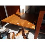 A pair of tall square darkwood pub / poser tables together with another oak pub table