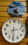 Two modern battery wall clocks including The Titanic