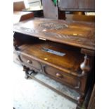A nicely carved oak monk's bench with box seat & tray top