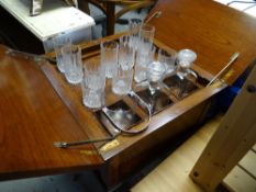 A quality reproduction mahogany & inlaid cantilever drinks cabinet with contents