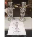 A pair of Baccarat, Paris lustre candlestick holders, large vase etc