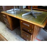 Large vintage light oak green leather tooled top desk with flanking drawers