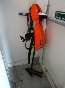 An electric outboard motor together with a life jacket & a small folding anchor