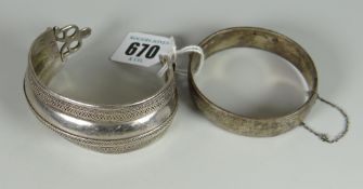 Two silver bangles, 69grms approx.