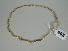 A continental gold & diamond bi-colour design necklace, estimated diamond weight 0.30cts, weight