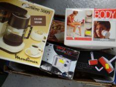 Box of various household items, coffee filter, camera, body massager etc