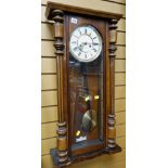 A mahogany cased Vienna wall clock