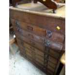 A large antique oak seven-drawer document / plan chest with lifting top & Art Nouveau-style metal
