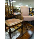 A modern pink dralon upholstered office chair together with a splat back & carved decorated oak hall