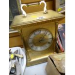 A large mantel clock together with a selection of mainly classical single records