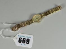 9ct gold ladies Accurist wristwatch on 9ct gold strap, 14.2grms overall approx.