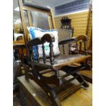 A vintage oak American rocking chair