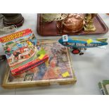 Vintage tin plate wind up airship toy & two vintage jigsaw puzzles