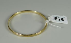 9ct gold ladies bangle, 26.2grms approx.