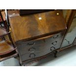 A neat vintage bow fronted drop front bureau with three drawers on cabriole legs