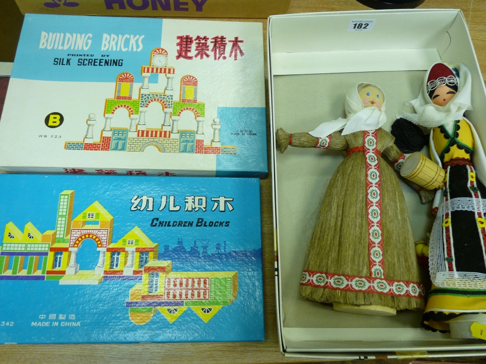 Pair of Russian wooden dolls and two building bricks sets, near mint (boxed)