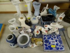 Collection of ornamental pottery shoes etc