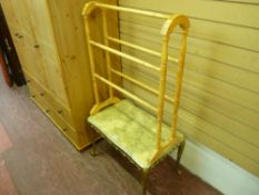 Light wood modern towel airer and a marble and onyx coffee table