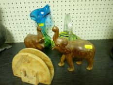 Pair of treen elephants, art glassware etc