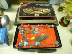 Parcel of boxed cutlery, hors d'oeuvres dish, cheese plate etc