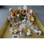 Collection of animal figurines in various materials including three Wade Disney figures
