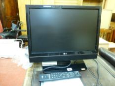 LG small flatscreen TV (with remote control) E/T