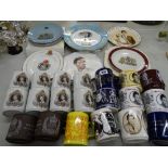 Collection of commemorative mugs and plates