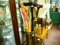 Brass stickstand with umbrella and stick contents