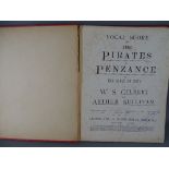 Vocal Score music book for the Pirates of Penzance by Gilbert & Sullivan, signed to the interior