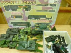 Group of unboxed military type vehicles by Corgi, Matchbox etc and a boxed Rocket Force set,