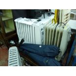 Three excellent oil filled type radiators one with remote control E/T