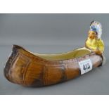 Burleigh ware posy holder in the form of an Indian in a canoe