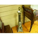 Metallic black and gilt cherub decorated table lamp with shade