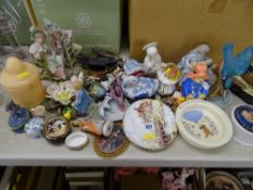 Quantity of ornaments and figurines including a pair of Victorian bisque seated figures