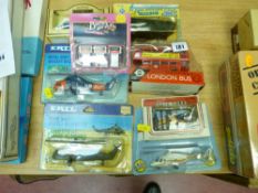 Collection of bubblepacked helicopters, vehicles, petrol pumps etc