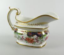 A SWANSEA PORCELAIN JAPAN PATTERN MILK JUG of rectangular bellied form with wide elevated spout,