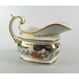 A SWANSEA PORCELAIN JAPAN PATTERN MILK JUG of rectangular bellied form with wide elevated spout,