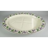 SWANSEA CREAMWARE MEAT PLATTER of oval form, decorated with a boarder of grape-vines, impressed mark