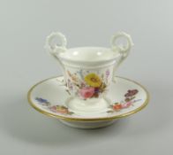 A NANTGARW PORCELAIN TWIN-HANDLED CUP & NON-MATCHING SAUCER the bell-shaped cup with turned foot and