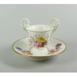 A NANTGARW PORCELAIN TWIN-HANDLED CUP & NON-MATCHING SAUCER the bell-shaped cup with turned foot and