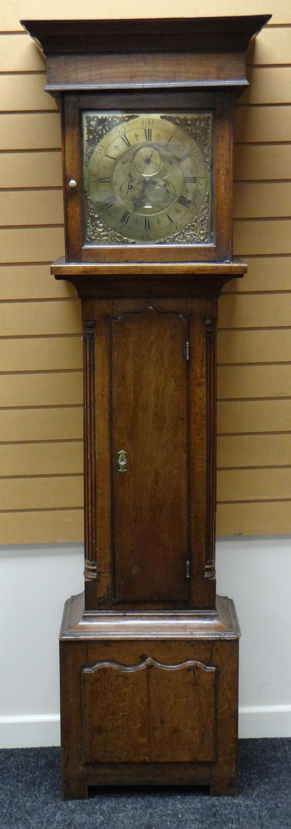 AN EIGHTEENTH CENTURY EIGHT DAY LONGCASE CLOCK BY JOHN OWEN OF LLANRWST, the brass face having